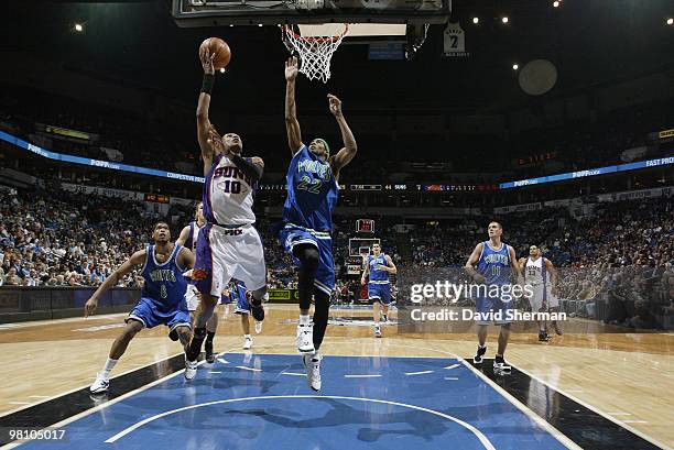 Leandro Barbosa of the Phoenix Suns shoots against Corey Brewer of the Minnesota Timberwolves during the game on March 28, 2010 at the Target Center...