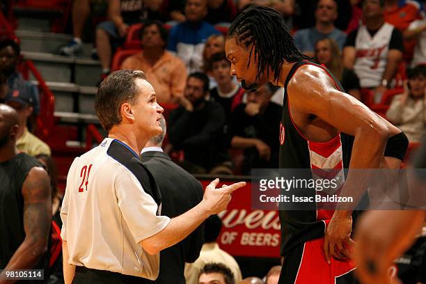 Chris Bosh of the Toronto Raptors argues a call by the official on March 28, 2010 at American Airlines Arena in Miami, Florida. NOTE TO USER: User...