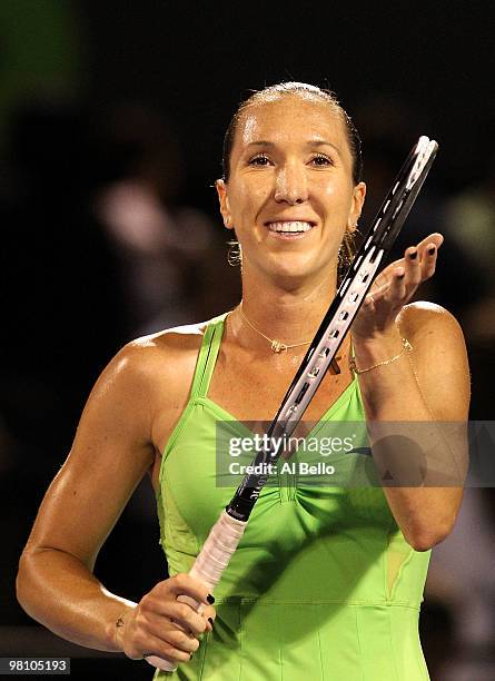 Jelena Jankovic of Serbia celebrates after defeating Elena Vesnina of Russia during day six of the 2010 Sony Ericsson Open at Crandon Park Tennis...