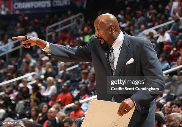 Head coach Mike Woodson of the Atlanta Hawks shouts a play during the game against the Indiana Pacers on March 28, 2010 at Philips Arena in Atlanta,...