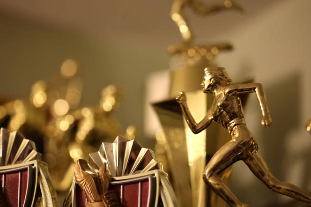 trophy's of success - trophies stock pictures, royalty-free photos & images