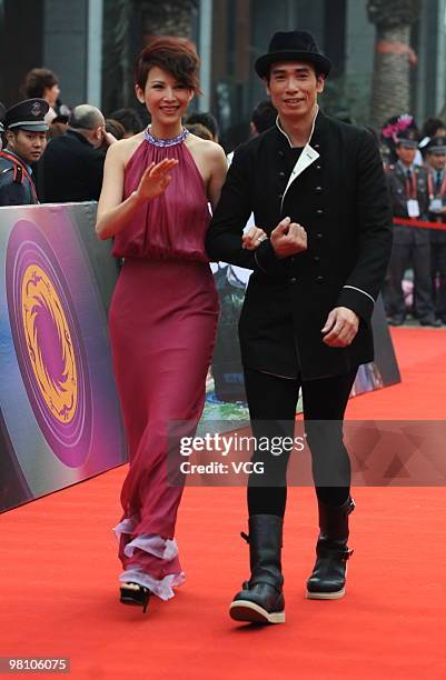 Ada Choi Siu Fun and Moses Chan arrive at the red carpet of the The 14th Chinese Music Award Ceremony held at Sichuan Investment International Tennis...