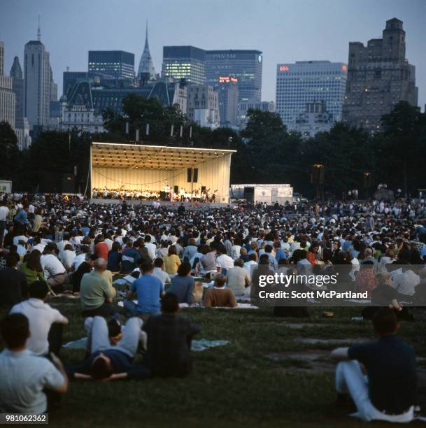 New York City - View of audience members in Central Park's Sheep Meadow for a Barbara Streisand concert.