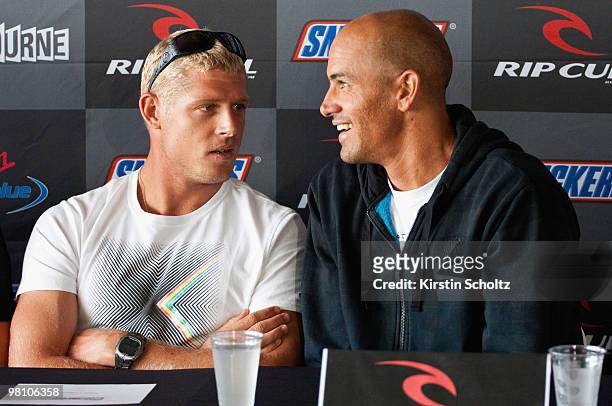 Reigning ASP World Champion Mick Fanning of Australia chats to Kelly Slater of the United States of America during the Rip Curl Pro press conference...