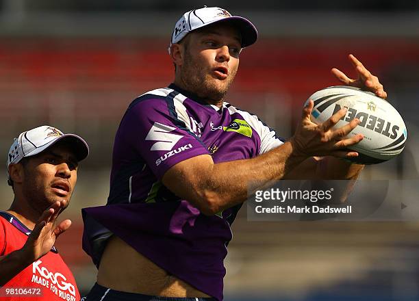 Luke MacDougall of the Storm takes a high pass during a Melbourne Storm NRL training session at Princes Park on March 29, 2010 in Melbourne,...