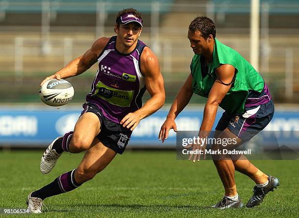 Billy Slater of the Storm evades a tackle during a Melbourne Storm NRL training session at Princes Park on March 29, 2010 in Melbourne, Australia.