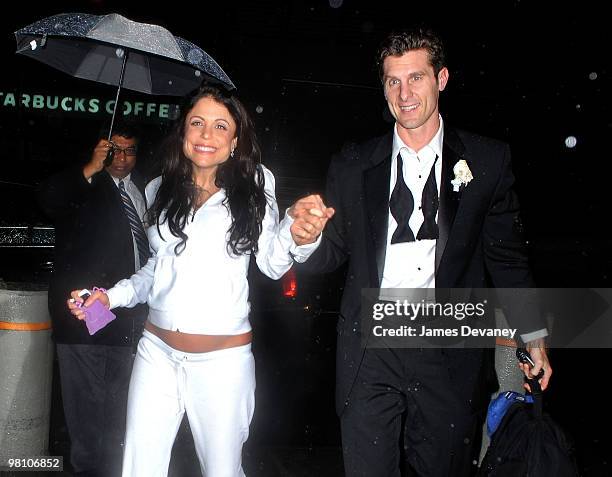 Bethenny Frankel and Jason Hoppy arrive at their hotel after their wedding at Four Seasons Restaurant on March 28, 2010 in New York, New York.