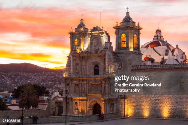 setting sun, basilica of our lady of solitude, mexico - oaxaca foto e immagini stock