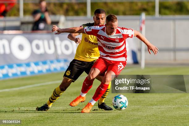 Jeremy Toljan of Dortmund and Fabian Schnabel of Zwickau battle for the ball during the Friendly Match match between FSV Zwickau and Borussia...