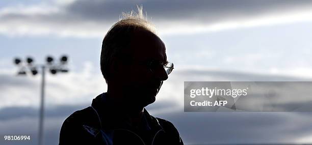 Manchester City manager Sven Goran-Eriksson watches his players warm up before a pre-season friendly match against Shrewsbury Town, in Shropshire, in...