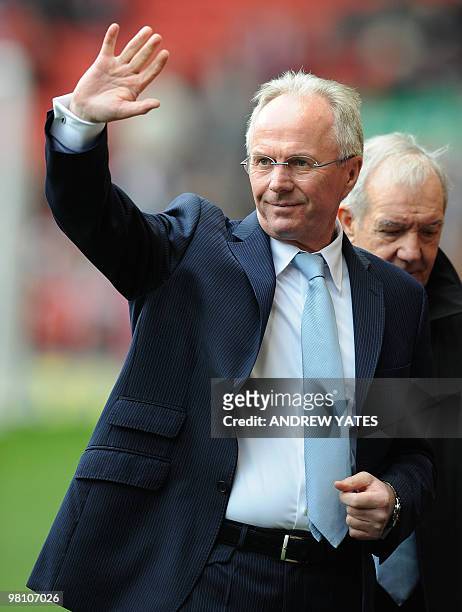 Manchester City's Swedish manager Sven-Göran Eriksson waves to the fans before the Premier league football match against Liverpool at Anfield,...