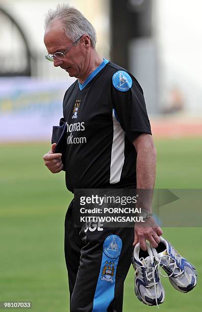 This file picture taken on May 16, 2008 in Bangkok shows former Manchester City manager Sven-Göran Eriksson looking down during a training session at...