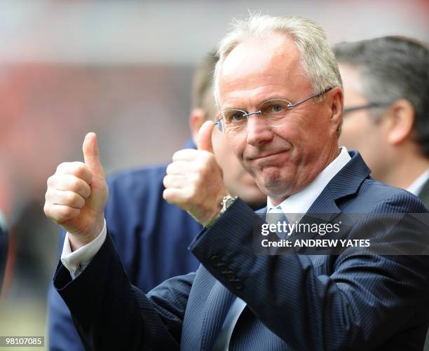 Manchester City's Swedish manager Sven-Göran Eriksson waves to the fans before the Premier league football match against Liverpool at Anfield,...