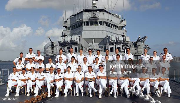 French staff officers pose on March 24 on board of French helicopter-carrier Jeanne d'Arc, during a call at San Juan in Puerto Rico. The Jeanne...