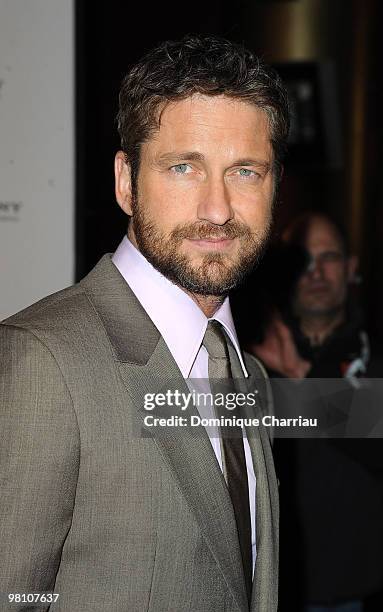 Actor Gerard Butler poses as he attends the Premiere of the film 'Le chasseur de Primes' at Cinema Gaumont Marignan on March 28, 2010 in Paris,...