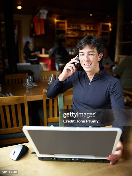 man using cell phone - john p kelly stock pictures, royalty-free photos & images