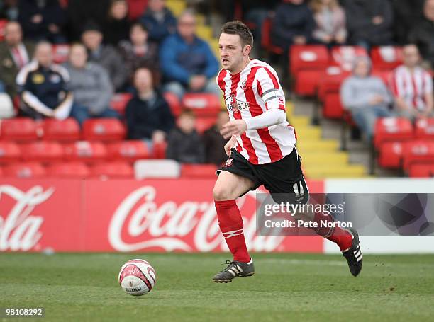 Scott Kerr of Lincoln City in action during the Coca Cola League Two Match between Lincoln City and Northampton Town at Sincil Bank Stadium on March...