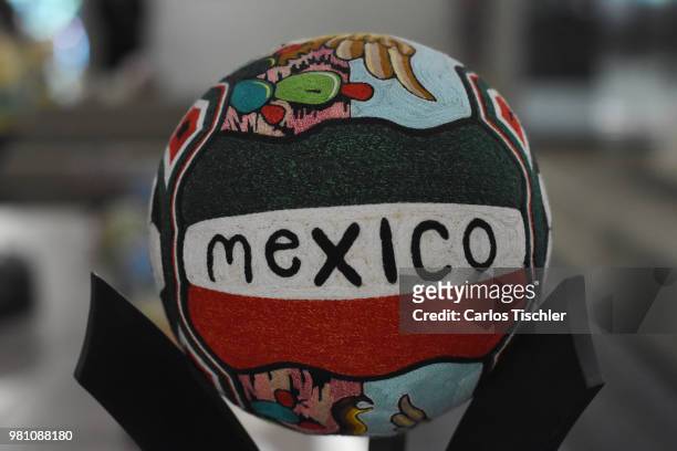 Football is display during the Huichol Art Biennial at Hotel Presidente Intercontinental on June 20, 2018 in Mexico City, Mexico. Artists capture...