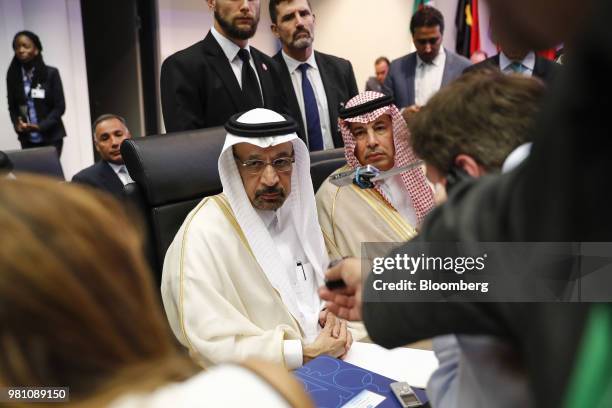 Khalid Al-Falih, Saudi Arabia's energy and industry minister, center, speaks to reporters ahead of the 174th Organization Of Petroleum Exporting...