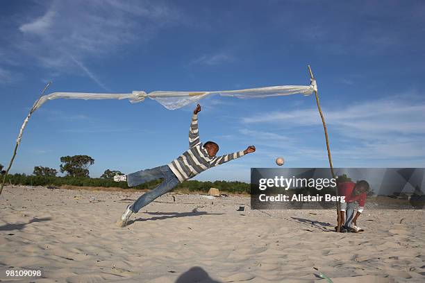 boys playing football  - khayelitsha foto e immagini stock