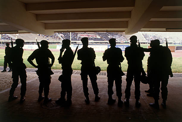 soldiers in a football stadium - insécurité senegal photos et images de collection