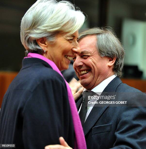 French Finance Minister Christine Lagarde laughs with Luxembourg Economy Minister Jeannot Krecke on March 16, 2010 before the start of an Economy and...
