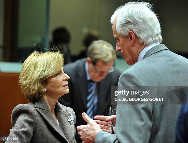 Spanish Finance Minister Elena Salgado speaks with EU internal market and services commissioner Michel Barnier on March 16, 2010 before the start of...