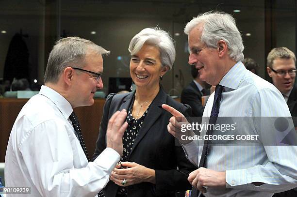 Economic and monetary affairs commissioner Olli Rehn , French Finance Minister Christine Lagarde and EU internal market and services commissioner...