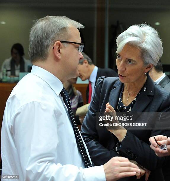 Economic and monetary affairs commissioner Olli Rehn and French Finance Minister Christine Lagarde take a break on March 16, 2010 during an Economy...