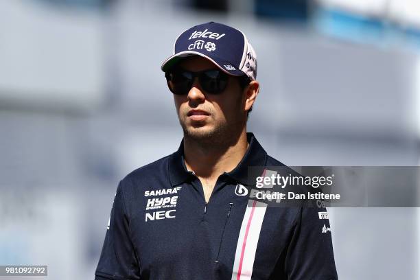 Sergio Perez of Mexico and Force India walks in the Paddock before practice for the Formula One Grand Prix of France at Circuit Paul Ricard on June...