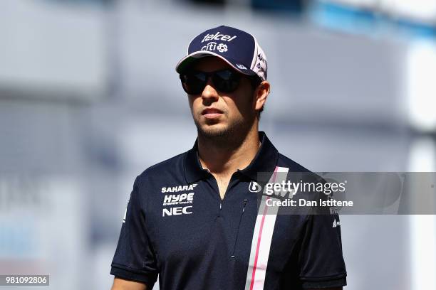 Sergio Perez of Mexico and Force India walks in the Paddock before practice for the Formula One Grand Prix of France at Circuit Paul Ricard on June...