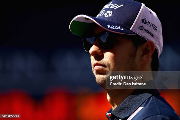 Sergio Perez of Mexico and Force India walks in the Paddock before practice for the Formula One Grand Prix of France at Circuit Paul Ricard on June...