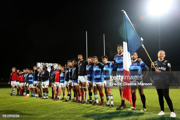 The French Barbarians look on during the national anthems ahead of the match between the Highlanders and the French Barbarians at Rugby Park Stadium...