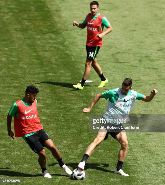 Tomi Juric and Massimo Luongo of Australia take part during an Australian Socceroos training session at Stadium Trudovye Rezervy on June 22, 2018 in...
