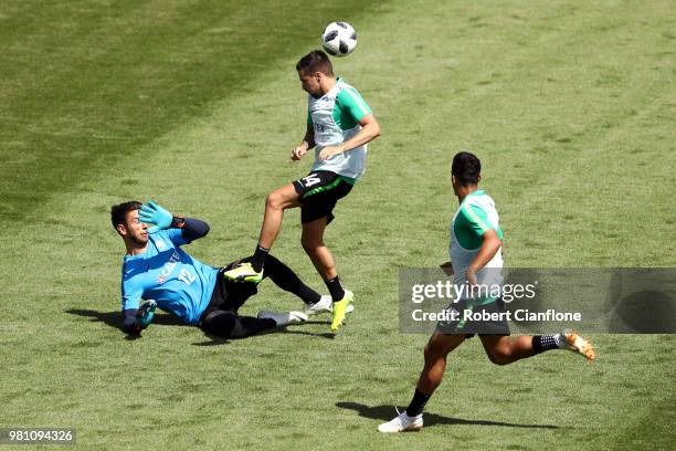 Brad Jones and Jamie MacLaren of Australia take part during an Australian Socceroos training session at Stadium Trudovye Rezervy on June 22, 2018 in...