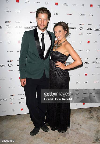 Axle Whitehead and Zoe Foster, hosts, arrive at the Australian Hair Fashion Awards at Sydney Town Hall on March 29, 2010 in Sydney, Australia.