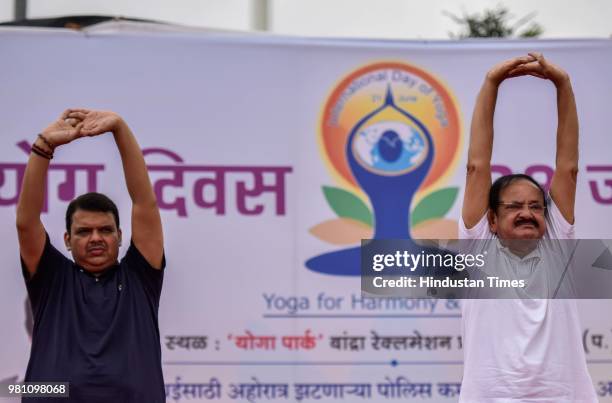 Vice-President Venkaiah Naidu with Maharashtra Chief Minister Devendra Fadnavis perform yoga at Bandra Reclamation Sealink Promenade on the occasion...