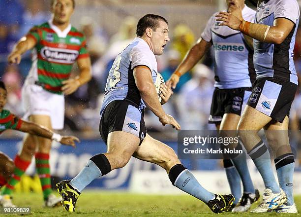 Paul Gallen of the Sharks runs the ball during the round three NRL match between the Cronulla Sharks and the South Sydney Rabbitohs at Toyota Stadium...