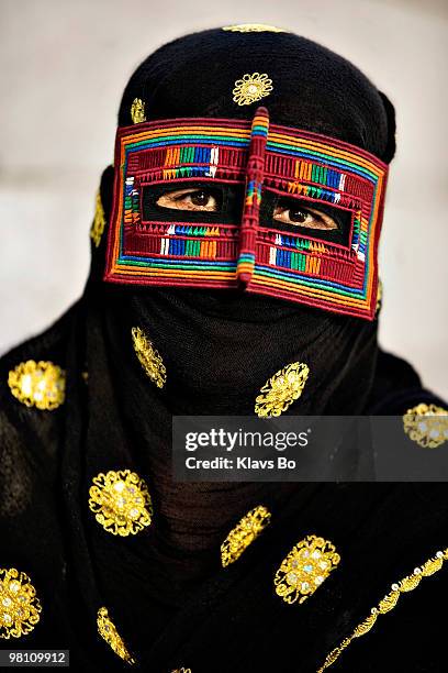 Fatemeh who has 10 children and is a housewife, wears the mask only to protect her skin. She is from the village of Jallabi. Many women in the...