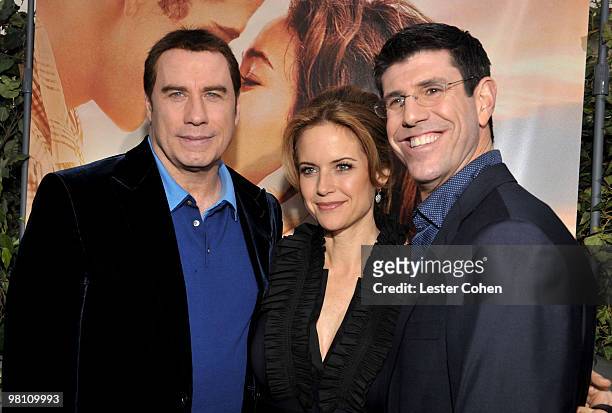 Actor John Travolta, wife actress Kelly Preston and Chairman of The Walt Disney Studios Rich Ross arrive at the "The Last Song" Los Angeles premiere...