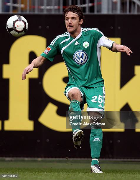 Christian Gentner of Wolfsburg controles the ball during the Bundesliga match between FSV Mainz 05 and VfL Wolfsburg at the Bruchweg Stadium on March...