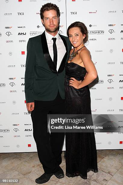 Axle Whitehead and Zoe Foster, hosts, arrive at the Australian Hair Fashion Awards at Sydney Town Hall on March 29, 2010 in Sydney, Australia.