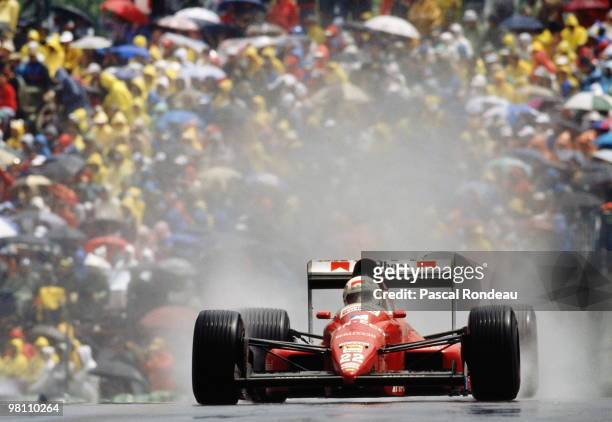 Andrea de Cesaris drives the Scuderia Dallara-Ford 189 in the rain to third place during the Canadian Grand Prix on 18 June 1989 at the Montreal...