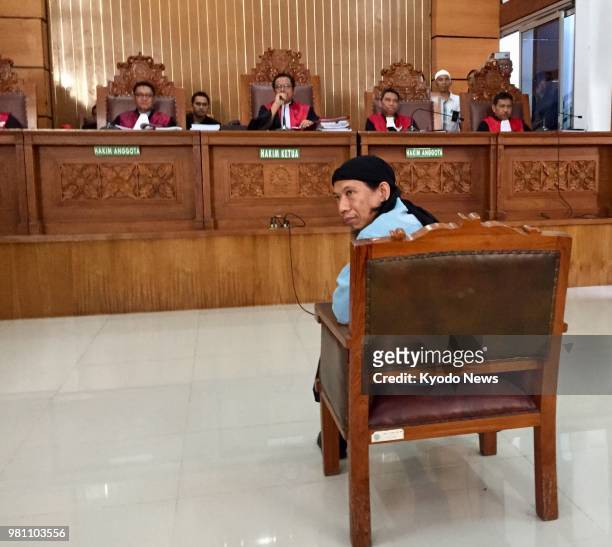 Photo taken June 22 shows Aman Abdurrahman, a key Islamic State figure in Indonesia, at the South Jakarta District Court. Aman was sentenced to death...