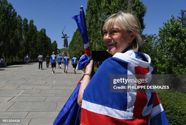 Supporters of Iceland's national football team visit the Mamayev Kurgan World War Two memorial complex in Volgograd on June 22 hours before the...