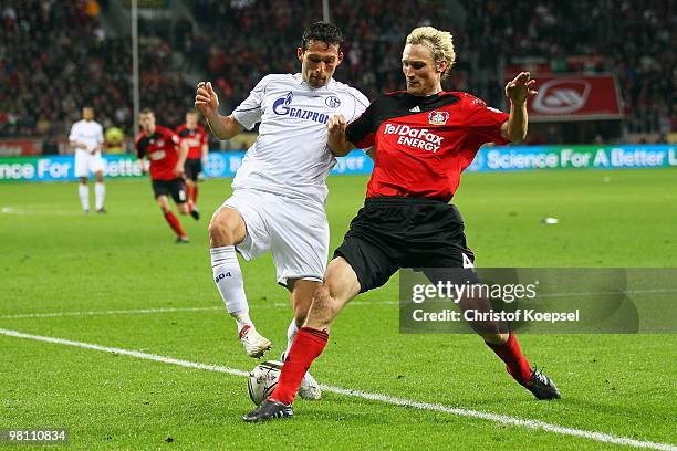 Sami Hyypiae of Leverkusen challenges Kevin Kuranyi of Schalke during the Bundesliga match between Bayer Leverkusen and FC Schalke 04 at the BayArena...