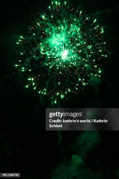 green fireworks - german greens party stock pictures, royalty-free photos & images