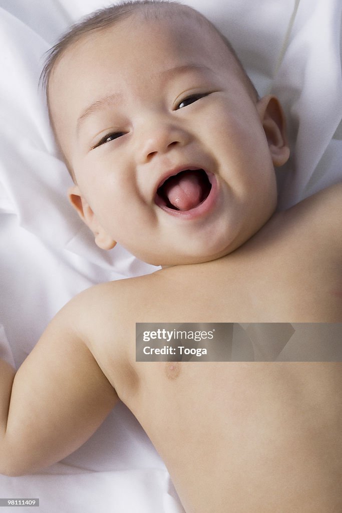 Overhead shot of baby laughing