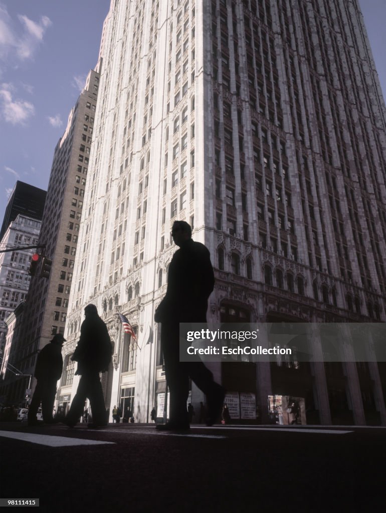 Silhouettes of people crossing Church Street