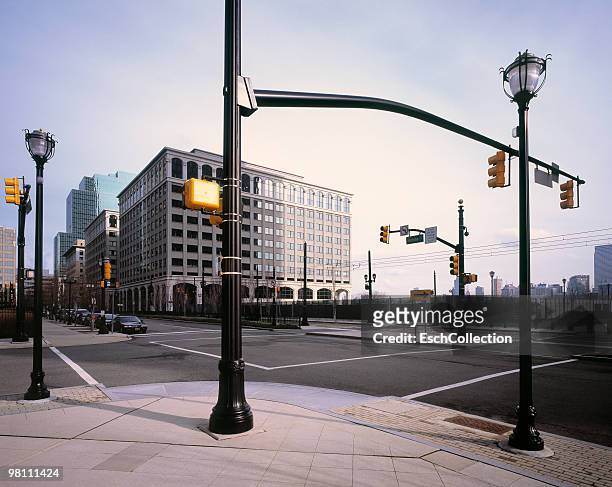 road junction with many traffic lights in new york - road intersection stock-fotos und bilder